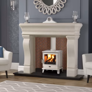 Hemingway fireplace surround with broad pillars and a traditional French mantel design.