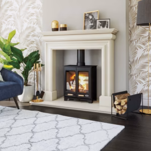 Wexford Georgian-influenced fireplace surround with barrel-shaped frieze and panelled pilasters.