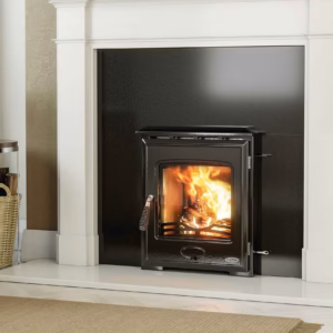 Arklow 4.6kW multi fuel insert stove installed in a fireplace setting.