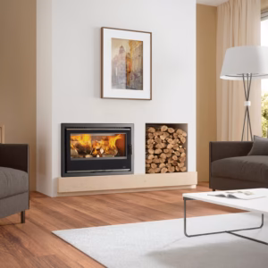 Portimao 700 7.3kW wood burning cassette stove shown in a contemporary fireplace setting.