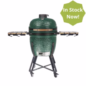 Emerald green Kamado 21 ceramic BBQ with side shelves and wheeled cart.