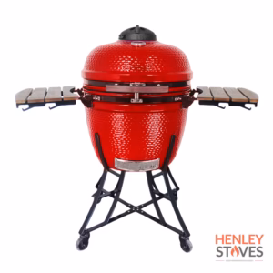 Red Kamado 24 ceramic BBQ with wooden side shelves and black wheeled stand.