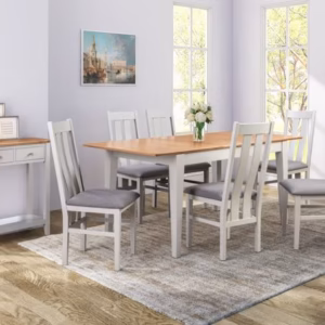 Abingdon Extendable Dining Table shown in a dining room with matching chairs