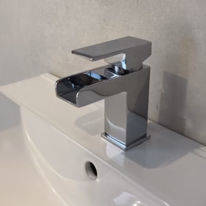 Bari chrome basin tap installed on a white bathroom basin