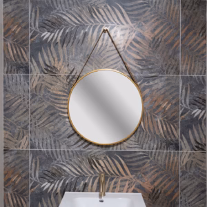 Golden Fern Wallpaper Tile used as a decorative bathroom feature wall behind a round mirror and basin.