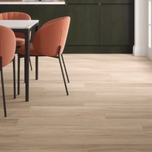 Tartas Oak laminate flooring shown in a modern dining room setting.